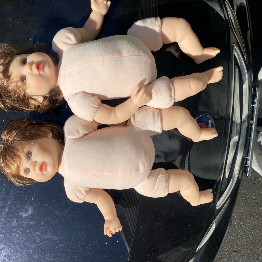 Adorable Brown-Haired Baby Dolls
